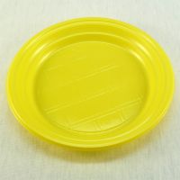Одноразовая желтая пластиковая тарелка 165 мм ПС