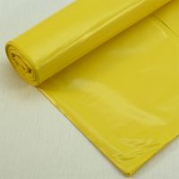 Одноразовая рулонная скатерть ПВД 110x180 см желтая